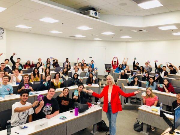 A guest speaker poses with students in a classroom for the "Exploring Entrepreneurship" course at USC Summer Programs. Read on to discover the top college majors in 2025.