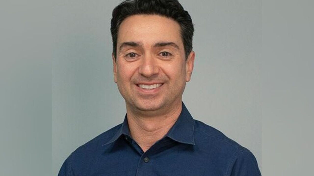 Headshot of Kamy Akhavan.